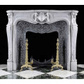 Indoor carved cultured marble fireplace surround